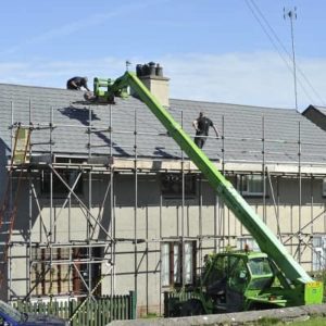 Roofing contractors replacing residential roof